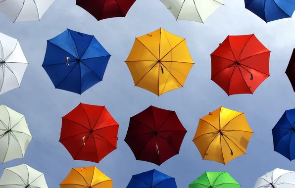 The sky, umbrellas, stormy weather