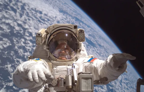 Picture astronaut, in orbit, earth from space, open space