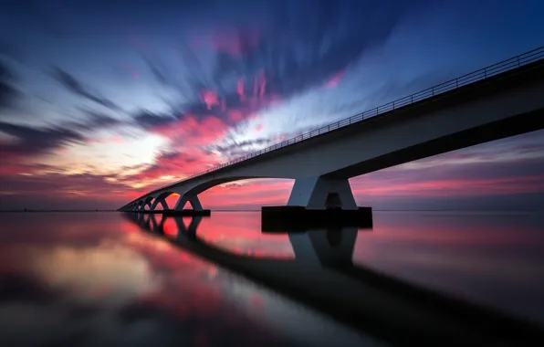 Picture the sky, water, clouds, reflection, bridge, excerpt