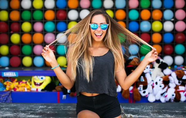 Girl, balls, shorts, glasses