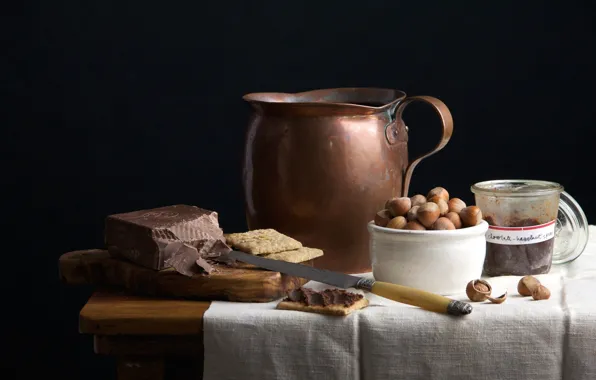 Picture table, chocolate, cookies, knife, Board, pitcher, nuts, still life