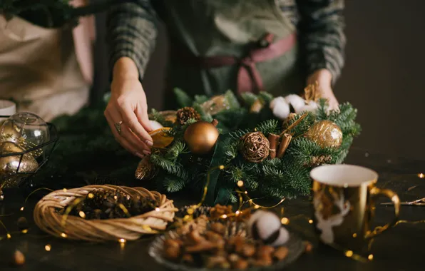 Picture garland, balls, hands, mug, wreath, Christmas decorations, preparing for the New Year, bumps