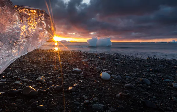 Ice, stones, shore, sunbeam