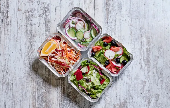 Lemon, tomatoes, olives, cucumbers, salad