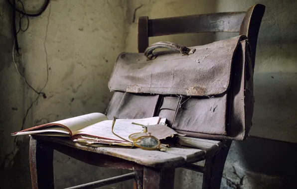Glasses, chair, book, portfolio