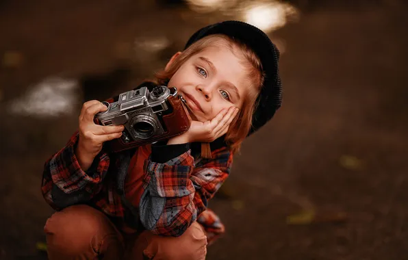 Look, child, boy, the camera