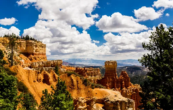 Picture the sky, clouds, trees, mountains, rocks, valley