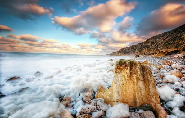 Sea, beach, the sky, foam, clouds, stones