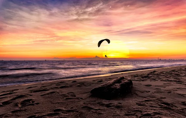 Sea, the sky, sunset, paraglider