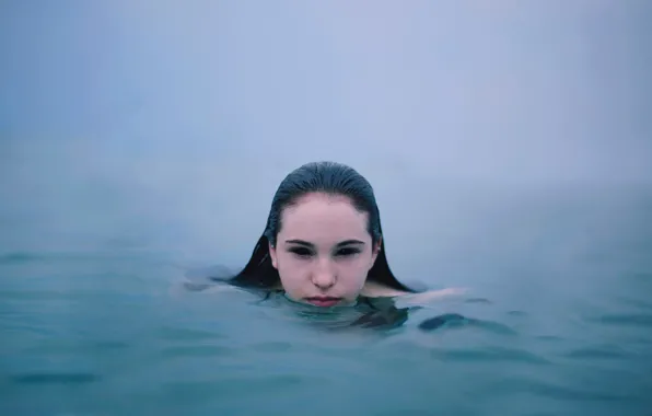 Look, girl, mermaid, in the water, Siren