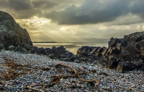 Sea, the sky, clouds, stones, rocks, coast, rays of light