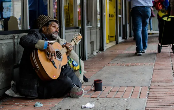 Street, people, guitar