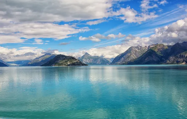 The sky, clouds, mountains, lake