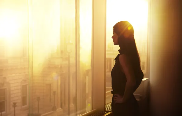 Picture girl, the sun, the city, window, girl at the window