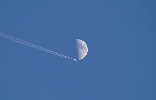 The sky, the moon, the plane