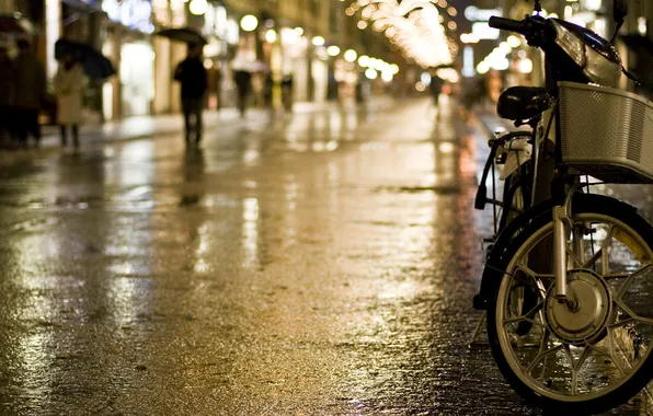 Picture the city, rain, the evening, bike