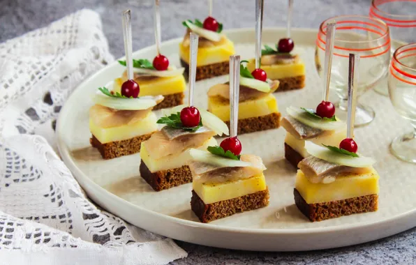 Potatoes, canapés, cranberry, herring