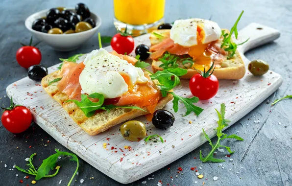 Fish, cheese, tomatoes, olives, sandwiches