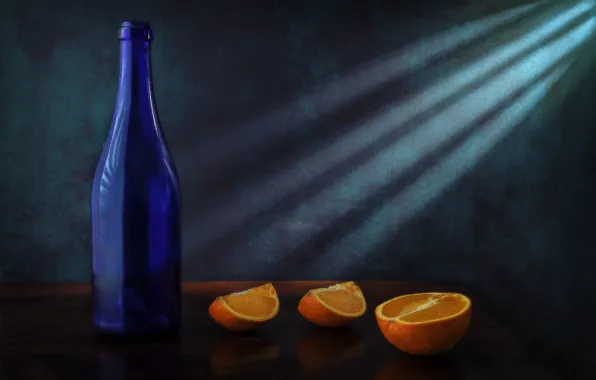 Glass, rays, light, the dark background, table, wall, bottle, orange