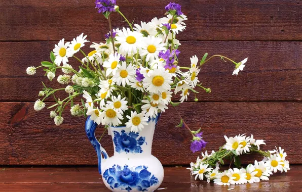 Picture chamomile, pitcher, wreath, wildflowers