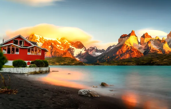 The sun, clouds, light, mountains, house, rocks, shore, tops