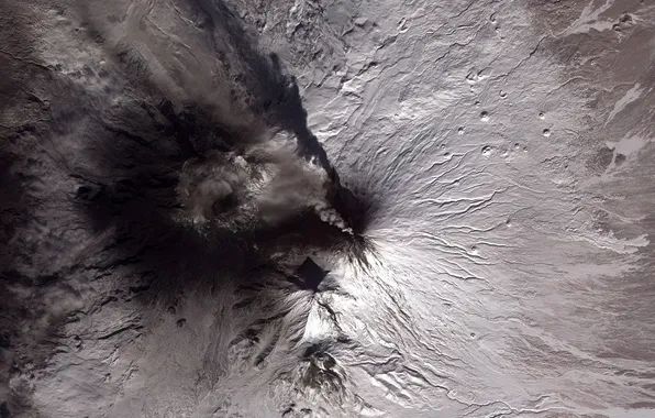 Picture the volcano, the eruption, from space