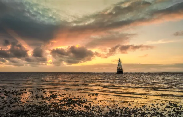 Sea, shore, lighthouse