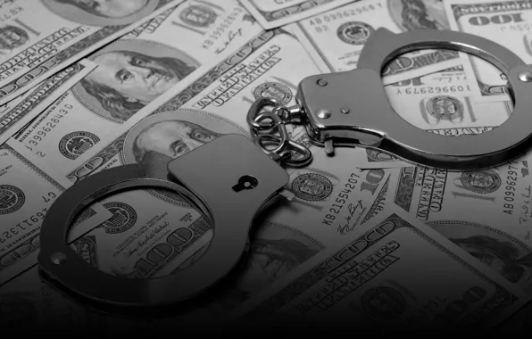 Picture money, police handcuffs, smuggling