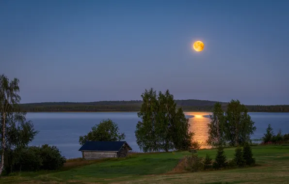 Picture lake, the moon, the evening, Finland