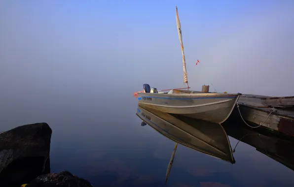Fog, lake, stones, boat, pier