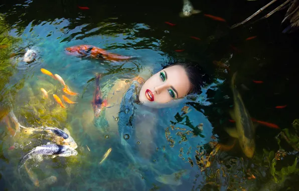 Picture girl, fish, in the water, Fish girl in a pond