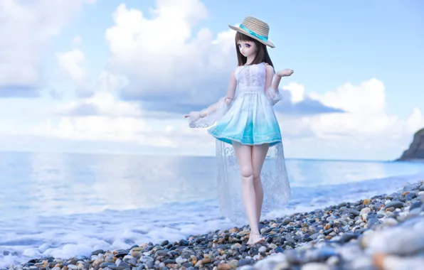 Sea, pebbles, doll, hat