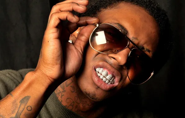 Picture hand, teeth, tattoo, glasses, male, guy, singer, rap
