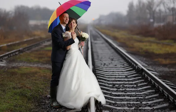 Umbrella, a couple, the bride, bokeh, the groom