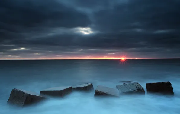 Sea, sunset, blocks