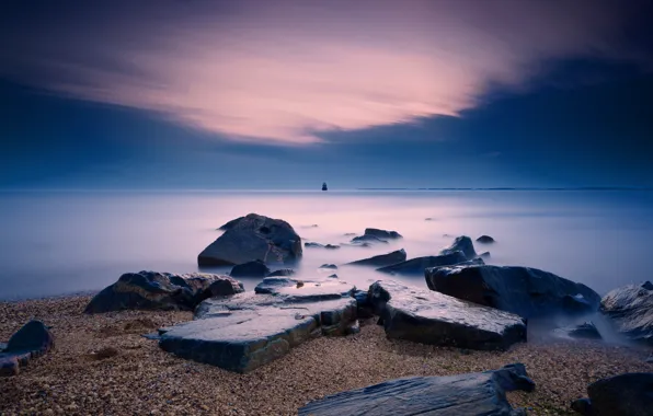 Picture sea, beach, stones, lighthouse, the evening
