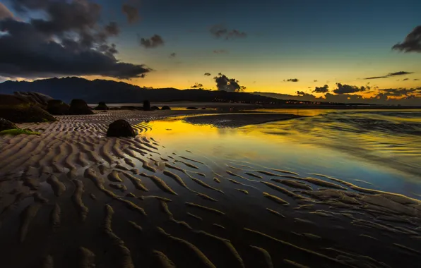 Picture sand, sea, the sky, mountains, clouds, stones, shore, the evening