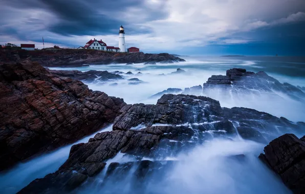 Storm, the ocean, rocks, lighthouse