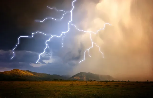 The storm, the sky, mountains, clouds, lightning, plain