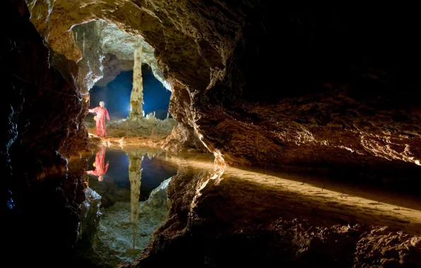Water, light, rock, reflection, stones, people, helmet, cave
