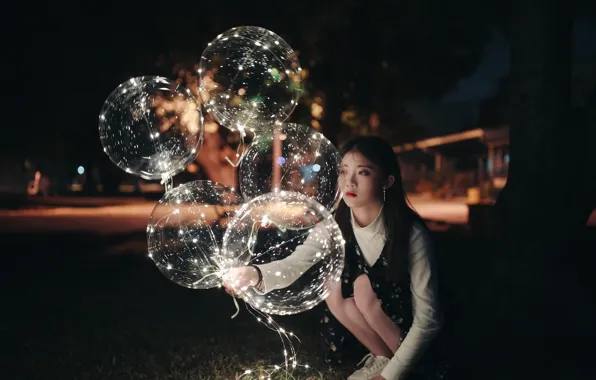 Girl, balls, sitting