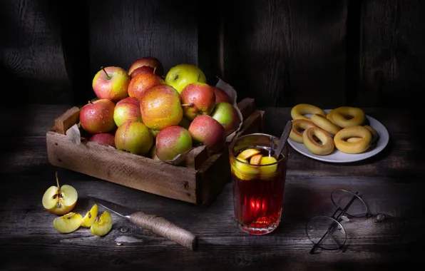 Glass, the dark background, table, apples, glasses, spoon, knife, the tea party