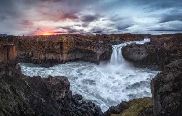 The sky, clouds, sunset, stones, overcast, rocks, shore, waterfall