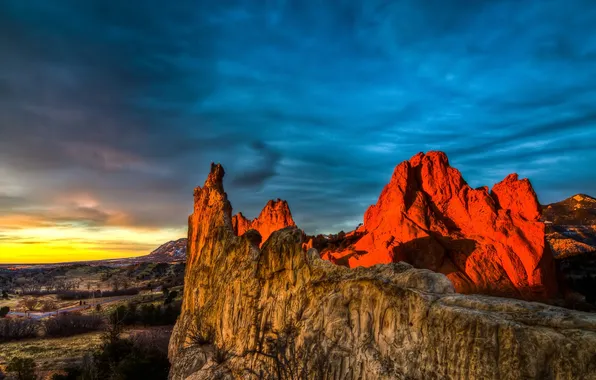 The sky, clouds, sunset, mountains, rocks, paint, glow