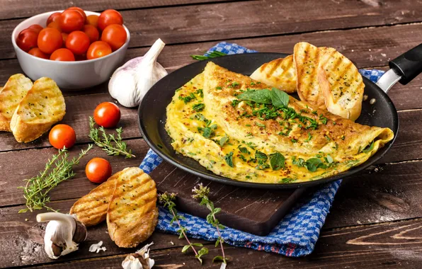 Bread, scrambled eggs, tomatoes, toast