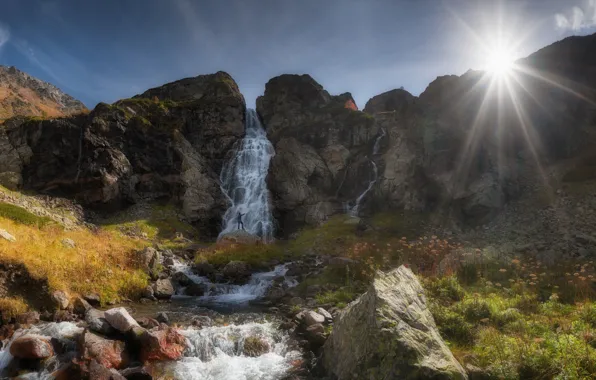 Picture the sun, rays, landscape, mountains, nature, river, stones, waterfall