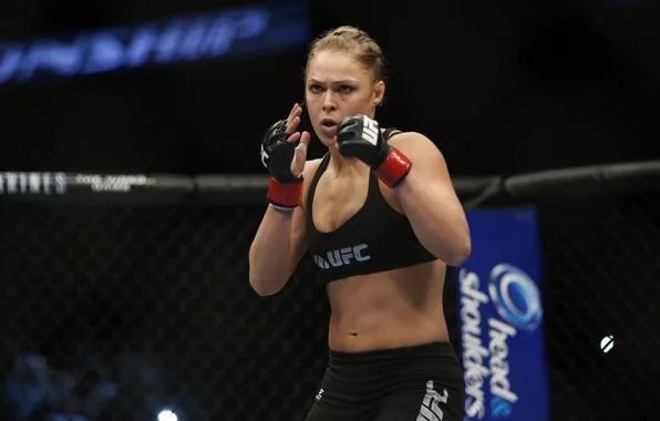 The champion of UFC, Ronda Rousey, The Armbar Assassin, Rhonda Jean Rouse, Rowdy, MMA fighter