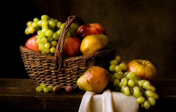 The dark background, table, apples, Board, towel, grapes, fruit, nuts