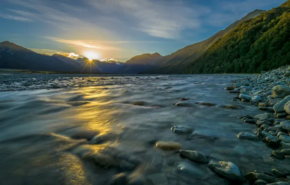 Water, the sun, mountains, river, stones