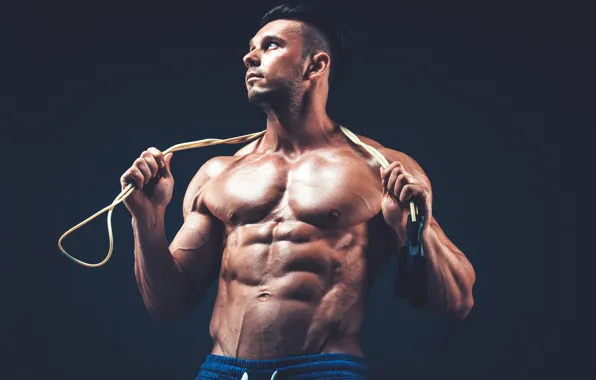 Athlete, male, black background, torso, muscles, press, athlete, jump rope